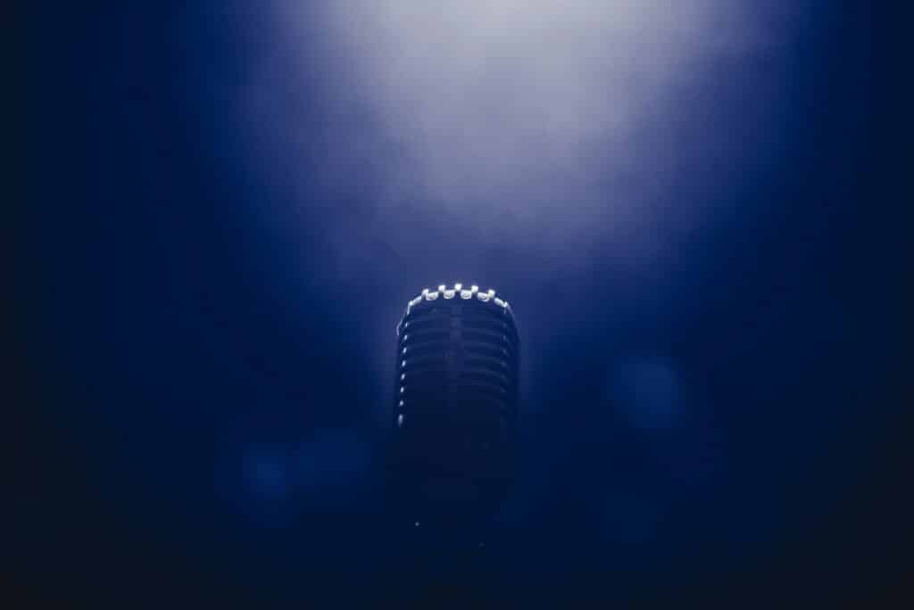 A stage microphone in low light