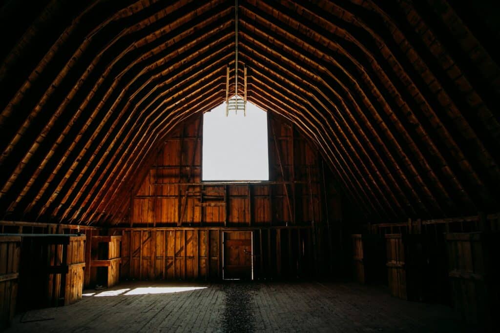 A weathered brown wooden barn